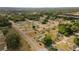 Residential neighborhood aerial view with neatly arranged homes, lush greenery, and streets at 16190 Sw 16Th Ct, Ocala, FL 34473