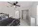 Bedroom with a ceiling fan, closet, and bright natural lighting at 16190 Sw 16Th Ct, Ocala, FL 34473