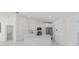 Bright kitchen with all white cabinets, marble counter tops and stainless steel appliances at 16190 Sw 16Th Ct, Ocala, FL 34473