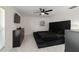 Main bedroom with lots of natural light, marble floors and black furniture at 16190 Sw 16Th Ct, Ocala, FL 34473
