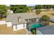 A screened-in pool area that includes an outdoor shed, adding functionality and leisure to the home at 16190 Sw 16Th Ct, Ocala, FL 34473