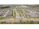 Aerial view of Silverleaf at Hamlin showcasing the community layout, streets, homes, and green spaces at 16489 Silver Brook Way, Winter Garden, FL 34787