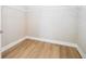 Spacious walk-in closet with wood floor and white shelving at 16489 Silver Brook Way, Winter Garden, FL 34787