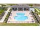The community pool features a covered lounging area and ample seating at 16489 Silver Brook Way, Winter Garden, FL 34787
