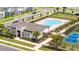 Aerial view of the community pool, amenity center, and tennis courts at 16489 Silver Brook Way, Winter Garden, FL 34787
