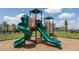 The community playground area features slides and climbing equipment at 16489 Silver Brook Way, Winter Garden, FL 34787