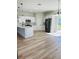 Modern kitchen boasts stainless steel appliances, white cabinets, and quartz countertops at 17762 Sw 33Rd Ter, Ocala, FL 34473