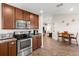 Well-equipped kitchen featuring stainless steel appliances and ample cabinet space at 1805 Kingsmill Dr, Bartow, FL 33830