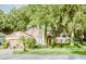 Charming single-Gathering home with lush landscaping and mature trees at 2102 Applegate Dr, Ocoee, FL 34761