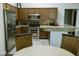 Bright kitchen featuring stainless steel appliances, granite countertops, and island at 2102 Applegate Dr, Ocoee, FL 34761