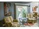 Cozy living room area with sliding glass door leading to outdoor patio at 2102 Applegate Dr, Ocoee, FL 34761