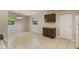 The bright dining area features tile flooring and offers ample space, perfect for enjoying meals with natural light from nearby windows at 212 Homewood Dr, Sanford, FL 32773