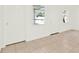 Bright bedroom boasting tile flooring, two closets, and natural light from two windows at 2417 Cedar Ave, Sanford, FL 32771