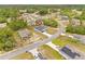 Aerial view of home on a street in the community surrounded by trees and neighboring homes at 2506 Sw 158Th Lane Rd, Ocala, FL 34473