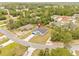 Overhead view of a house situated in a neighborhood, with surrounding greenery and nearby homes at 2506 Sw 158Th Lane Rd, Ocala, FL 34473