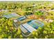Aerial view of recreational area featuring tennis courts, pickle ball, and a playground at 2506 Sw 158Th Lane Rd, Ocala, FL 34473