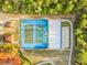 Aerial view of tennis courts providing ample space for matches and active lifestyle at 2506 Sw 158Th Lane Rd, Ocala, FL 34473