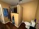 Bathroom featuring granite countertops, dual sinks, and a tiled walk-in shower at 25824 Shawnee St, Sorrento, FL 32776