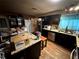 Eat-in kitchen featuring stainless steel appliances and countertops at 25824 Shawnee St, Sorrento, FL 32776