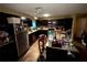Well-equipped kitchen featuring stainless steel appliances and a kitchen island at 25824 Shawnee St, Sorrento, FL 32776