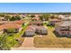 Aerial view of a single-story home with a red tile roof at 441 Caraway Dr, Kissimmee, FL 34759