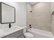 Modern bathroom featuring neutral tile shower and vanity at 441 Caraway Dr, Kissimmee, FL 34759