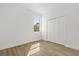 Bright bedroom with wood-look floors and a window at 441 Caraway Dr, Kissimmee, FL 34759