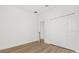 Bright bedroom with wood-look floors and a closet at 441 Caraway Dr, Kissimmee, FL 34759