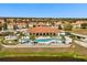 Beautiful neighborhood pool with palm trees at 441 Caraway Dr, Kissimmee, FL 34759