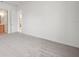 Large bedroom with neutral carpet, crisp white walls, and ample space at 453 Sorrento Rd, Kissimmee, FL 34759