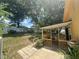 Spacious backyard with lush green grass and a covered patio, great for outdoor entertaining at 561 Portland Cir, Apopka, FL 32703