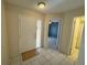 Welcoming foyer with tile flooring, neutral paint, and views into the living spaces at 561 Portland Cir, Apopka, FL 32703