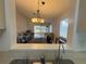 Open-concept living and dining area at 561 Portland Cir, Apopka, FL 32703