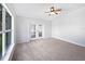 Spacious bedroom with natural light, carpet flooring, and ceiling fan at 612 Doe Cove Pl, Apopka, FL 32703