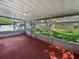 Screened porch overlooking backyard at 612 Doe Cove Pl, Apopka, FL 32703
