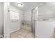 Neutral bathroom with a shower and tub combination, large window and bright lighting at 6245 Sleepy Hollow Dr, Orlando, FL 32810