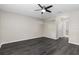 Spacious bedroom featuring new flooring, fresh paint, ceiling fan, and natural light at 6245 Sleepy Hollow Dr, Orlando, FL 32810
