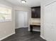 Hallway featuring built-in desk space and fresh paint at 6245 Sleepy Hollow Dr, Orlando, FL 32810