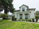 Charming two-story home with mature landscaping and stylish architectural details at 635 Whitman Cv, Longwood, FL 32750