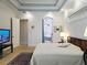 Spacious main bedroom leading to en suite bathroom, bathtub and shower at 635 Whitman Cv, Longwood, FL 32750