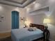Bright main bedroom with a tray ceiling, carpeted floors, furnishings, and an open door leading to the bathroom at 635 Whitman Cv, Longwood, FL 32750