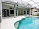 Spacious outdoor living area with sparkling pool and spa at 635 Whitman Cv, Longwood, FL 32750