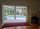 Screened-in pool area outside the home featuring a beautiful backyard at 635 Whitman Cv, Longwood, FL 32750