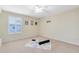 Bedroom featuring large window dressed with shutter blinds and some workout equipment on a rug at 707 Evening Sky Dr, Oviedo, FL 32765