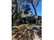 Restaurant exterior with a parking in rear sign, surrounded by lush trees and landscaping along the sidewalk at 724 Barrington Cir, Winter Springs, FL 32708