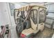 Interior of garage featuring a golf cart at 747 Louise Ln, The Villages, FL 32163