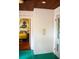 Bedroom highlighting built-in wardrobe and stained-glass door leading to bedroom at 748 W Florence Ave, Deland, FL 32720