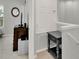 Hallway with decorative furnishings and a staircase at 8445 Leeland Archer Blvd, Orlando, FL 32836