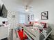 Cheerful ' bedroom featuring Mickey Mouse-themed decor, twin beds, and playful accents at 8518 La Isla Dr, Kissimmee, FL 34747
