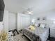 Bedroom with closet, ceiling fan, and neutral tones at 8518 La Isla Dr, Kissimmee, FL 34747
